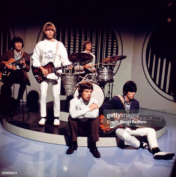 English rock group The Rolling Stones posed on the set of the ABC Television pop music television show Thank Your Lucky Stars at Alpha Television...