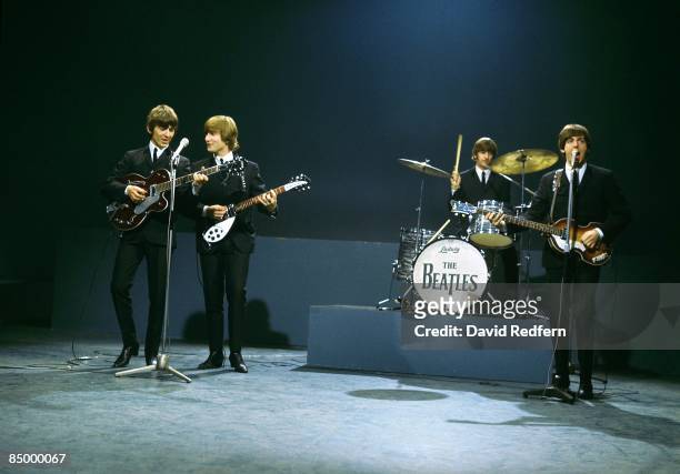 From left, George Harrison , John Lennon , Ringo Starr and Paul McCartney of English rock and pop group The Beatles perform together on stage for the...