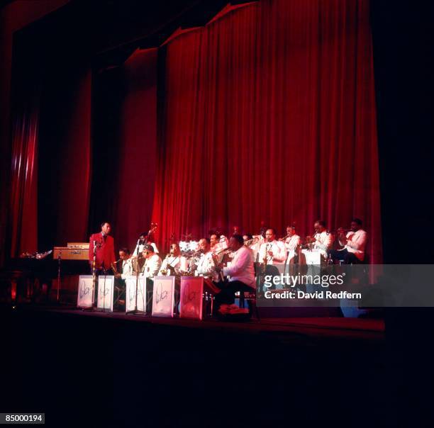 American composer, pianist and bandleader Duke Ellington performs live on stage with his orchestra at Colston Hall in Bristol, England on 25th...