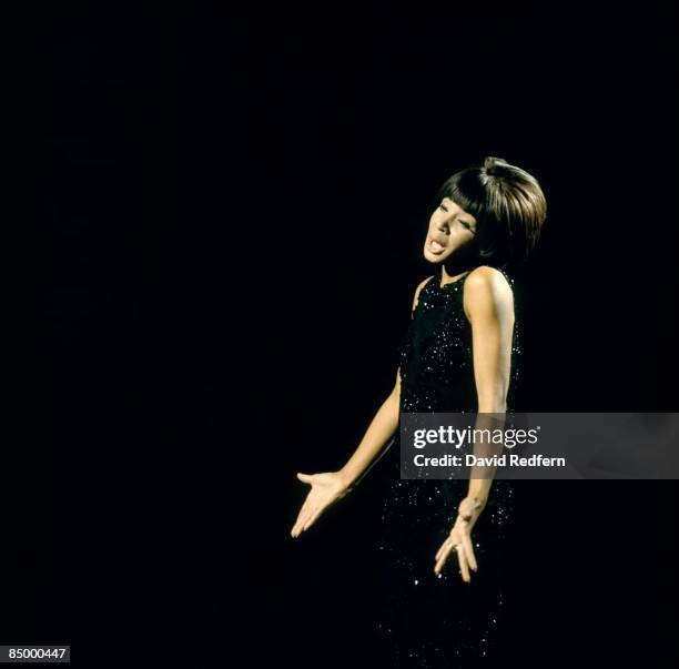 Welsh singer Shirley Bassey performs on a television show in London circa 1965.