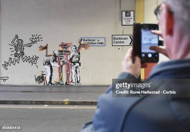 New mural by street artist Banksy depicting the late Jean- Michel Basquiat on Golden Lane by the Barbican Centre on September 20, 2017 in London,...