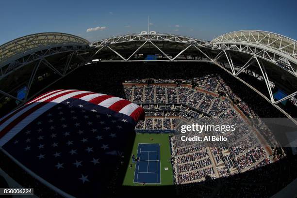 Alexandr Dolgopolov of Ukraine battles against Rafael Nadal of Spain in Arthur Ashe Stadium during their fourth round Men's Singles match on Day...