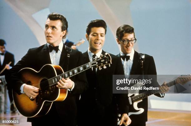 From left, Bruce Welch, Cliff Richard and Hank Marvin of Cliff Richard And The Shadows perform together on the pop music television show Thank Your...