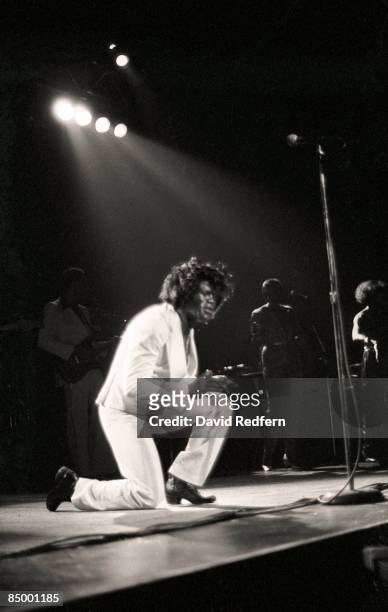 American soul singer and songwriter James Brown performs live on stage at the Hammersmith Odeon in London in December 1981. James Brown would play...
