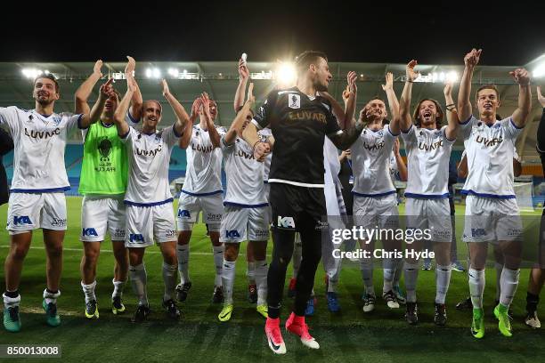 South Melbourne celebrate winning the FFA Cup Quarter Final match between Gold Coast City FC and South Melbourne at Cbus Super Stadium on September...