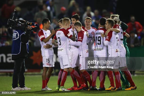 Wanderers celebrate victory in the penalty shoot out during the FFA Cup Quarterfinal match between Blacktown City and the Western Sydney Wanderers at...