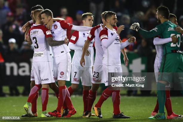 Wanderers celebrate victory in the penalty shoot out during the FFA Cup Quarterfinal match between Blacktown City and the Western Sydney Wanderers at...