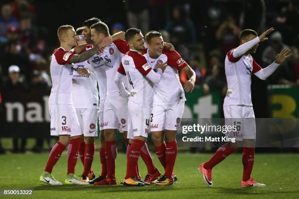 Wanderers celebrate victory in the penalty shoot out during the FFA Cup Quarterfinal match between Blacktown City and the Western Sydney Wanderers at...