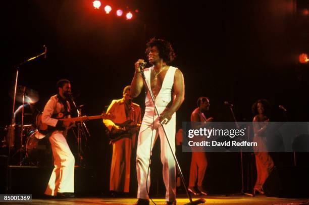 American soul singer and songwriter James Brown performs live on stage at the Hammersmith Odeon in London in December 1981. James Brown would play...