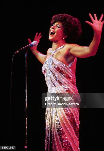Welsh singer Shirley Bassey performs live on stage circa 1980.