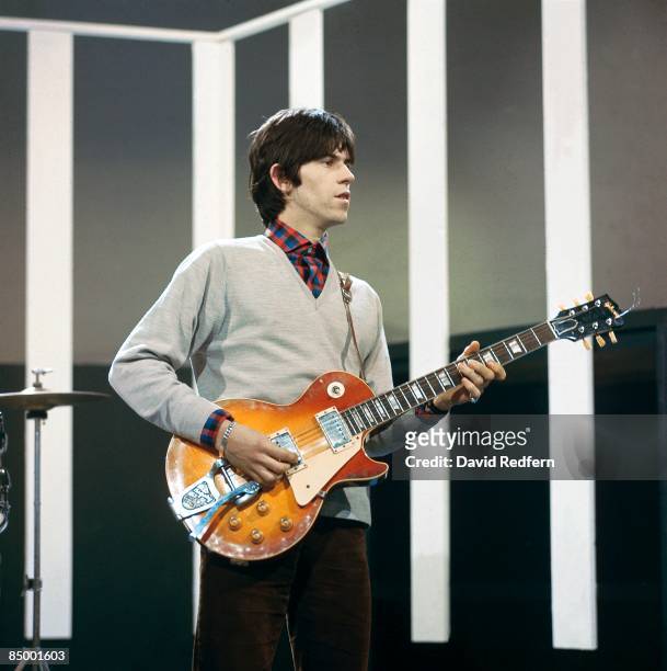 English guitarist Keith Richards of rock group The Rolling Stones plays a Gibson Les Paul guitar with Bigsby Vibrato on the set of the ABC Television...