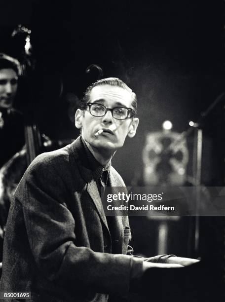 American jazz pianist Bill Evans at the piano during a performance by the Bill Evans trio filmed for the BBC Television music series 'Jazz 625' at...