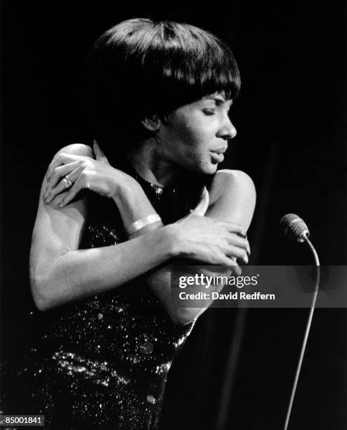 Welsh singer Shirley Bassey performs live on stage in London circa 1965.