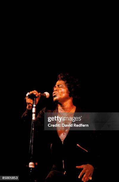 American soul singer and songwriter James Brown performs live on stage at the Midem music conference in Cannes, France in January 1981.