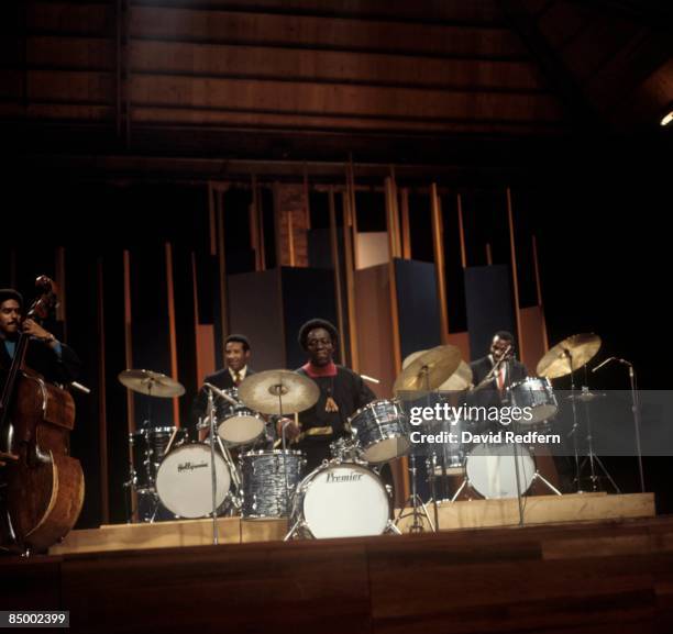 American jazz drummer Art Blakey , in centre, plays a Premier drum kit with fellow drummers Max Roach , on left, and Elvin Jones during the recording...