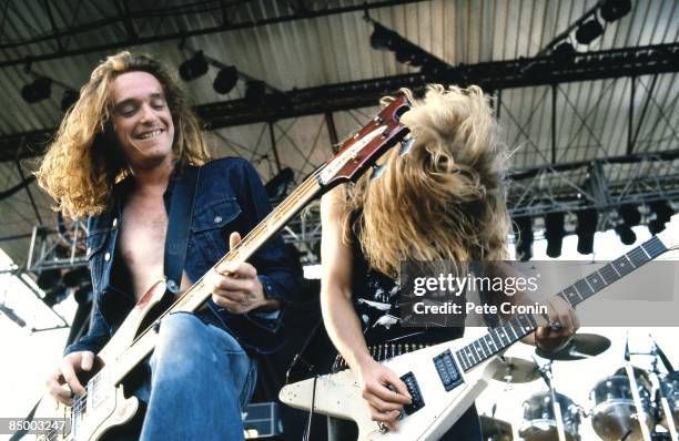 Photo of METALLICA and Cliff BURTON and James HETFIELD; Cliff Burton and James Hetfield performing live onstage