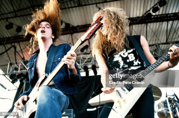 Photo of METALLICA and James HETFIELD and Cliff BURTON; Cliff Burton and James Hetfield performing live onstage