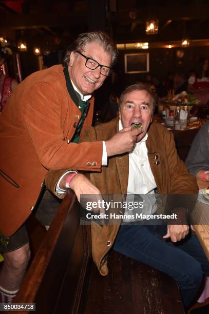 Michael Hartl and Frank Fleschenberg attend the Charity Lunch at 'Zur Bratwurst' during the Oktoberfest 2017 on September 20, 2017 in Munich, Germany.