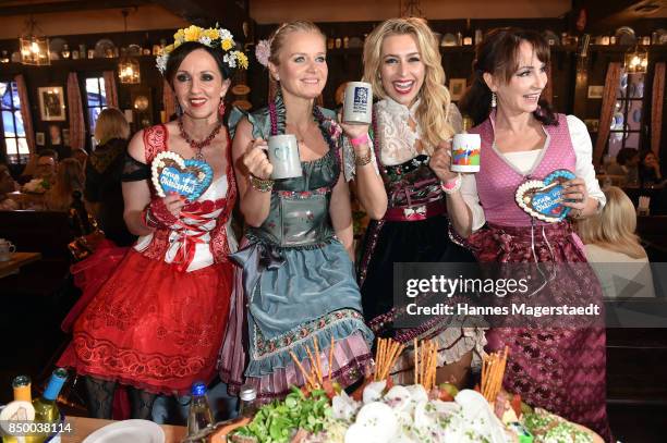 Angelika Zwerenz, Barbara Sturm, Verena Kerth and Anna Maria Kaufmann attend the Charity Lunch at 'Zur Bratwurst' during the Oktoberfest 2017 on...