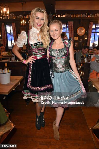 Verena Kerth and Barbara Sturm attend the Charity Lunch at 'Zur Bratwurst' during the Oktoberfest 2017 on September 20, 2017 in Munich, Germany.