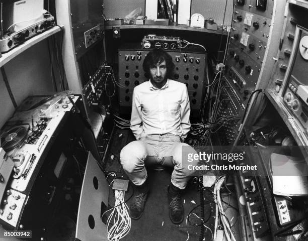 Photo of Pete TOWNSHEND and The Who, Pete Townshend, posed, amongst recording equipment in home studio