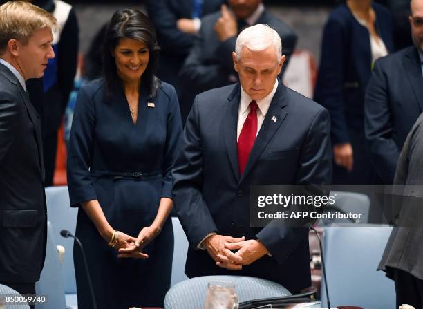 Vice President Mike Pence and Ambassador to the United Nations Nikki Haley attend a meeting of the UN Security Council on peacekeeping operations,...