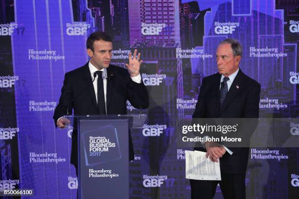 French President Emmanuel Macron speaks alongside Michael Blooomberg at the Global Business Forum on September 20, 2017 in New York City. Heads of...