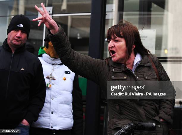 Mick Philpott's sister Dawn Bestwick reacts outside Nottingham Crown Court after Mick Philpott and his wife Mairead were sentenced for killing six of...