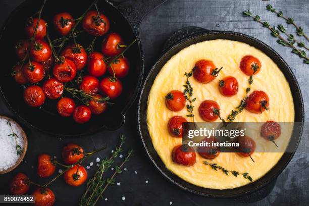 roasted omelette with cherry tomatoes - glazen pot stock pictures, royalty-free photos & images