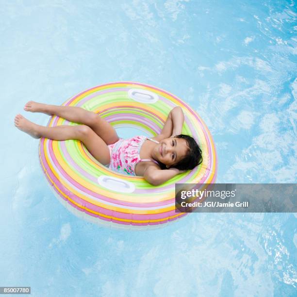 Tween Floating Inpool 1,024 Girl Floating In Tube In Pool Stock Photos, High-Res Pictures ...