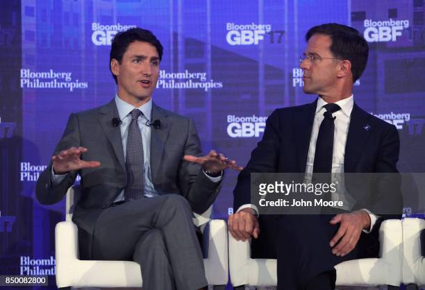 Canadian Prime Minister Justin Trudeau speaks next to Dutch Prime Minister Mark Rutte at the Bloomberg Global Business Forum on September 20, 2017 in...