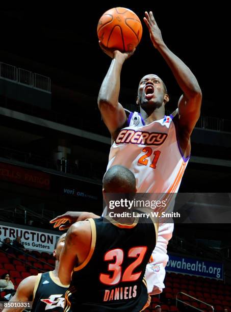 Erik Daniels of the Erie Bayhawks gets hit by Patrick Sanders of the Iowa Energy while going for the basket on February 23, 2009 at Wells Fargo Arena...