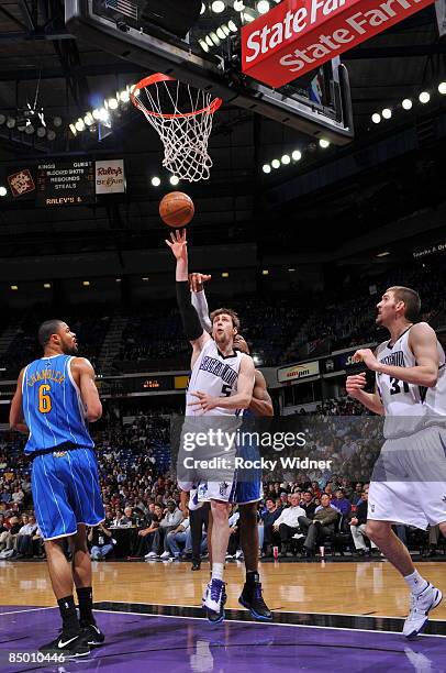 Andres Nocioni of the Sacramento Kings takes the ball to the basket against the New Orleans Hornets on February 23, 2009 at ARCO Arena in Sacramento,...