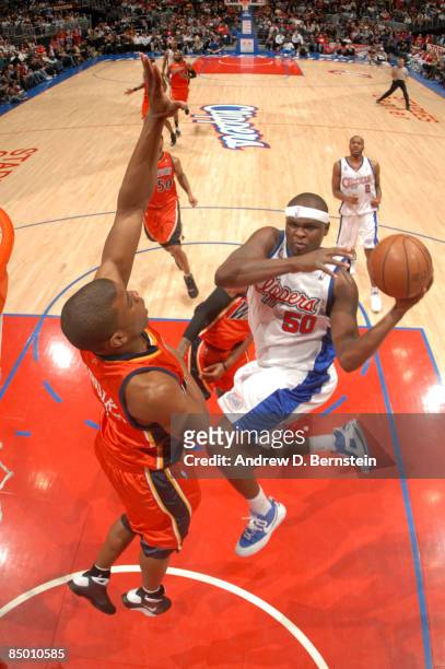 Zach Randolph of the Los Angeles Clippers goes up for a shot against Kelenna Azubuike of the Golden State Warriors at Staples Center on February 23,...