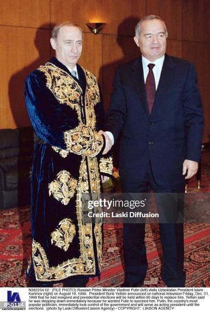 Russian Prime Minister Vladimir Putin visits Uzbekistan President Islam Karimov on August 16, 1999. President Boris Yeltsin announced on national...