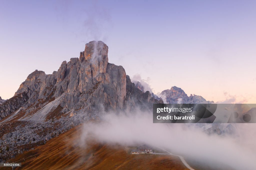 Dolomites mountains the Passo di Giau, Monte Gusela at behind  Nuvolau gruppe at sunset