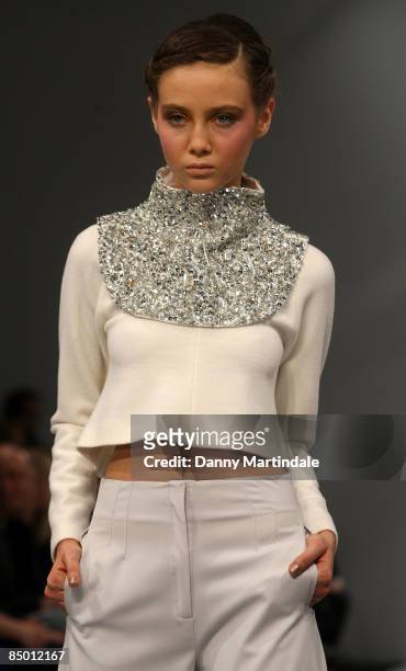 Model walks the runway at the Osman Yousefzada show at London Fashion Week Autumn/Winter 2009 at The Science Museum on February 24, 2009 in London,...