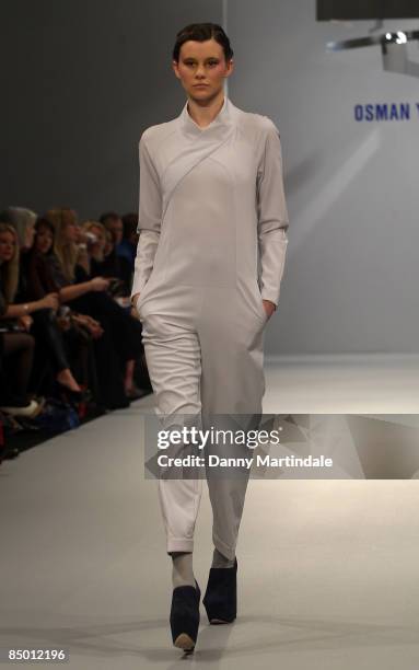 Model walks the runway at the Osman Yousefzada show at London Fashion Week Autumn/Winter 2009 at The Science Museum on February 24, 2009 in London,...