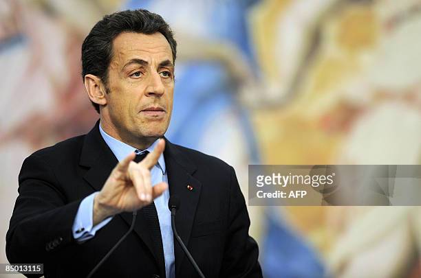 French President Nicolas Sarkozy gestures during a joint news conference with Italian Prime Minister Silvio Berlusconi in Villa Madama in Rome on...