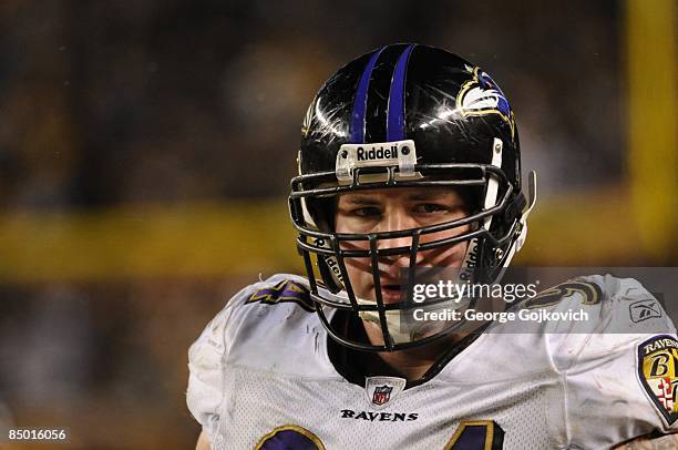 Defensive lineman Justin Bannan of the Baltimore Ravens looks on from the field during the AFC Championship game against the Pittsburgh Steelers at...