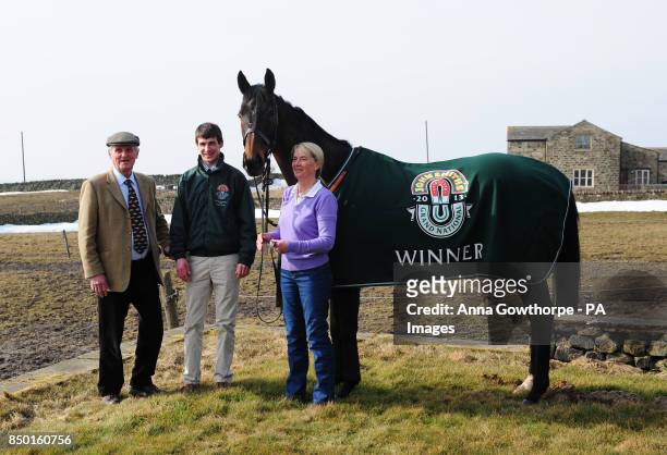 Auroras Encore with trainers Harvey and Sue Smith and winning jockey Ryan Mania during the winners photocall at Craiglands Farm, Bingley.