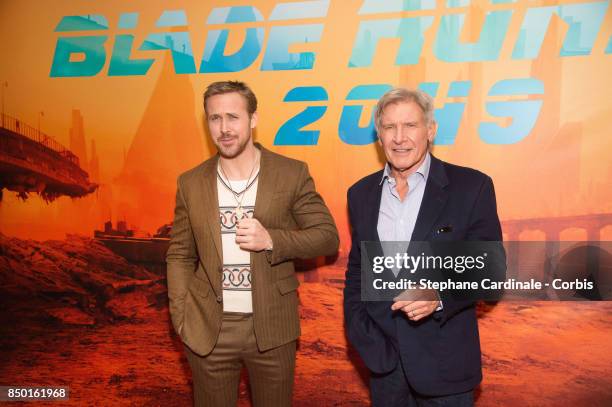 Actors Ryan Gosling and Harrison Ford attend the "Blade Runner 2049" Photocall at Hotel Le Bristol on September 20, 2017 in Paris, France.