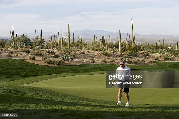 World Match Play Championship: Scenic view of Steve Williams, caddie of Tiger Woods walking the course during Monday practice before tournament play...