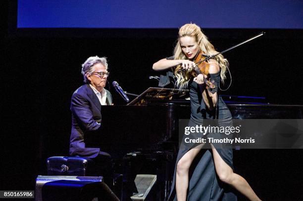 David Foster and Caroline Campbell perform during the 2017 GRAMMY Museum Gala Honoring David Foster at The Novo by Microsoft on September 19, 2017 in...