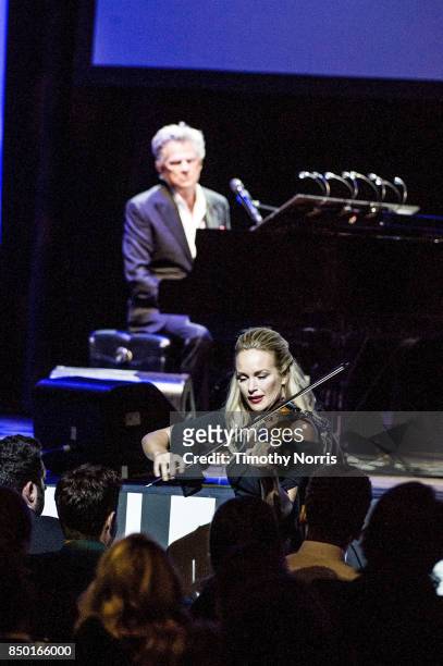David Foster and Caroline Campbell perform during the 2017 GRAMMY Museum Gala Honoring David Foster at The Novo by Microsoft on September 19, 2017 in...