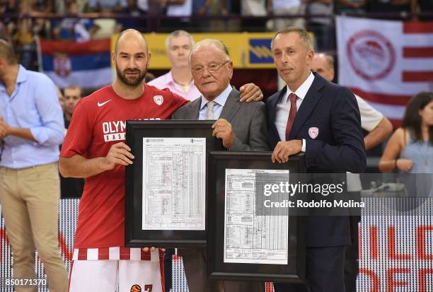 Vassilis Spanoulis, #7 of Panathinaikos Piraeus and Milan Tomic, former player of Olymapicos Piraeus poses during the Dusan Ivkovic Honored As...