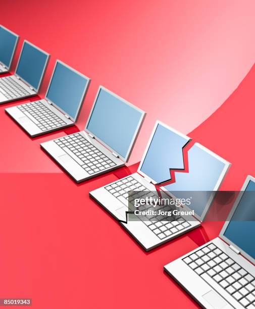 row of computers, one is broken - damaged laptop stock illustrations