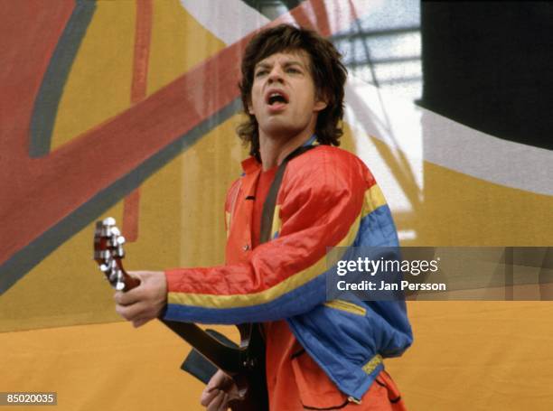 Photo of Mick JAGGER and ROLLING STONES; Mick Jagger performing live onstage, playing guitar at Ullevi Stadium, Gothenburg