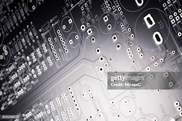 light glow on black circuit board - c computer code stock pictures, royalty-free photos & images