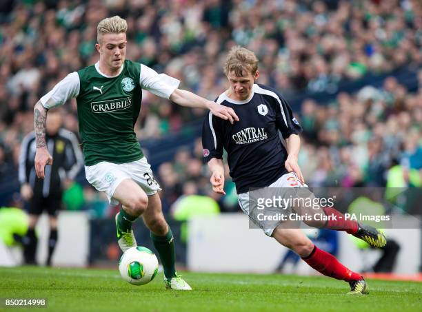 Hibernian's Danny Handling battles for the ball with Falkirk's Stephen Kingsley during the Scottish Cup Semi Final at Hampden Park, Glasgow.
